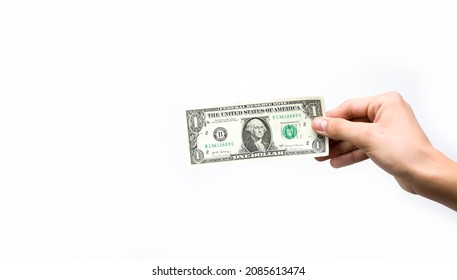 Expensive To One Dollar. Hand Holding One Dollar Banknote