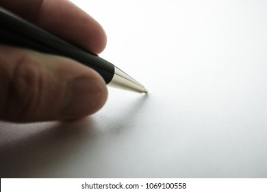 An Expensive Pen On A White Backdrop.