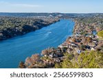 Expensive waterfront homes line the Colorado river near Austin Texas from Mount Bonnell