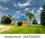 Experience the beauty and tradition of Mary of the Immaculate Conception Church in Alliston, a stunning red brick landmark since 1855