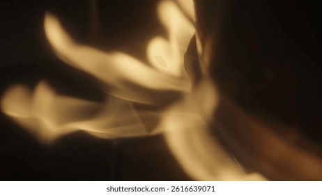 Experience the Dynamic Motion of Flames with Captivating Warm Light Effects Enhancing the Scene. Media