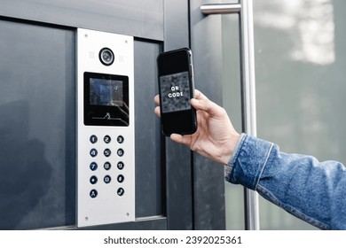 Experience modern access with QR codes, streamlining entry into a state-of-the-art high-rise building.