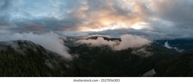 Experience the serene beauty of Stave Lake in Mission, BC, Canada, as viewed from above. This scene captures lush forests and misty mountains under a captivating sunset sky. - Powered by Shutterstock