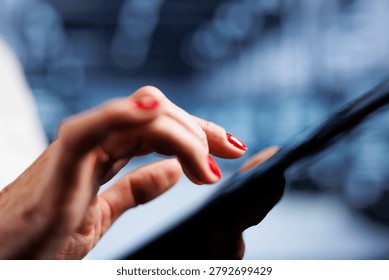 Experienced employee using tablet, ensuring valuable data remains shielded from potential security problems, safeguarding server rows against unauthorized access and vulnerabilities, close up