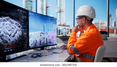 Experienced Engineer Analyzes Real-time Data On Digital Twin Screens Daily.