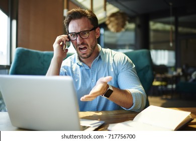 Experienced executive manager quarreling with employee on mobile yelling and screaming  about bad report and failure with project, mad boss angry about software bugs in application for work