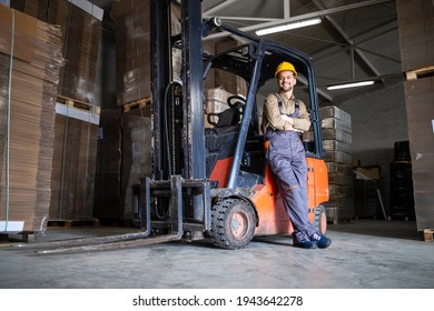 Experienced Forklift Driver In Warehouse Storage Room.