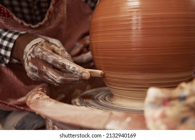 Experienced Male Potter Working On Soft Clay