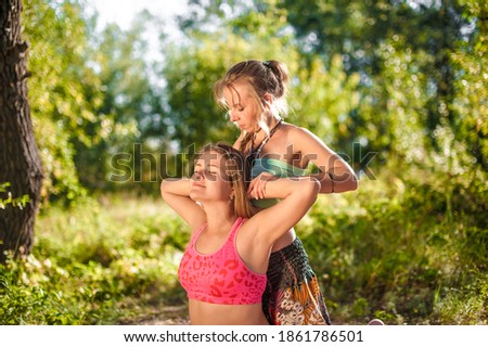 Experienced masseuse impliments her massage abilities on the ground.