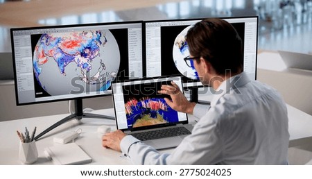 Experienced Meteorologist Analyzes Computer Data To Predict Weather And Climate Changes.