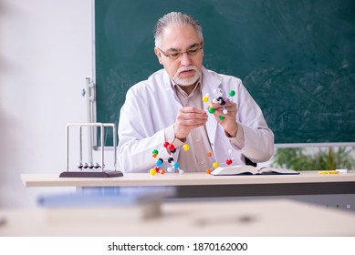 Experienced Old Scientist Working In The Lab