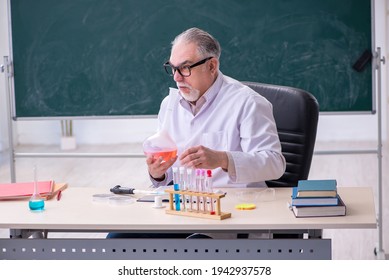 Experienced Old Scientist Working In The Lab