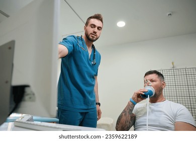 Experienced pulmonologist performing spirometry test on adult person