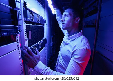 Experienced Serious System Administrator Monitoring Network Server