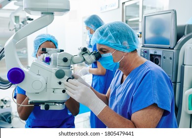 Experienced Surgeon Performing Laser Eye Vision Correction In Clinic