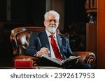 Experienced University Rector Posing in Library