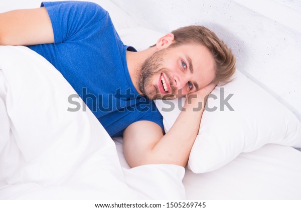 Experiencing Supreme Pleasure Single Man Smiling Stock Photo