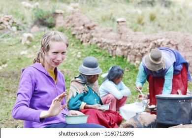 Experiential Travel Of Caucasian Woman In The Community Of Latin America. 