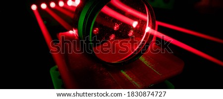 Experiment with red laser in optics lab