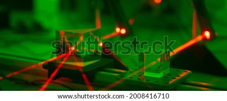 Experiment with a red laser in a physics lab