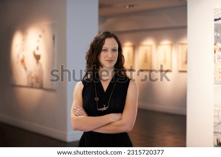 Expert, arms crossed and portrait of a woman at an art gallery for an exhibition. Creative, culture and a museum manager with management of paintings, collection and curator of pictures at a studio