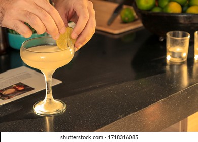 The Expert Bartender Is Making A Cocktail At The Home Party. Man Preparing Cocktails.