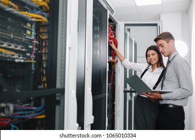 IT expert checking supercomputer server