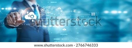 IT expert holding digital dashboard. Cloud Computing delivers scalable storage, servers, and applications through secure internet-based infrastructure.