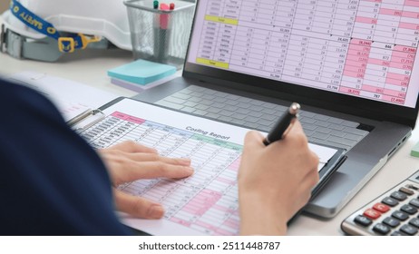 Expert woman asian female people review data number costing managerial account prepare monthly actual cost variance report at tax audit office. ESG sheet budget control ERP process service project. - Powered by Shutterstock