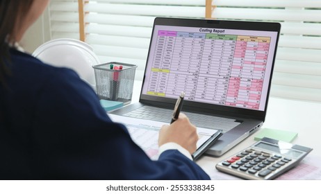 Expert woman asian female people review data number costing managerial account prepare monthly actual cost variance report at tax audit office. ESG sheet budget control ERP process service project.