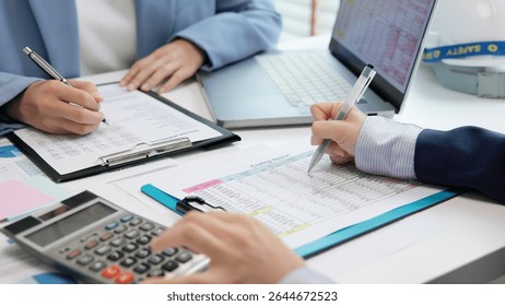 Expert woman asian female people review data number costing managerial account prepare monthly actual cost variance report income tax at audit office. ESG budget control ERP process service project.