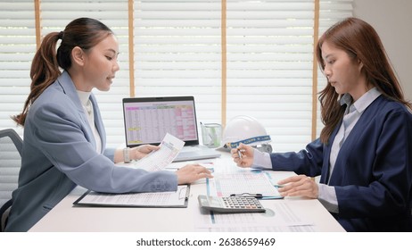 Expert woman asian people discuss review data number costing managerial account prepare monthly actual cost variance report income tax at audit office. ESG budget control ERP process service project.