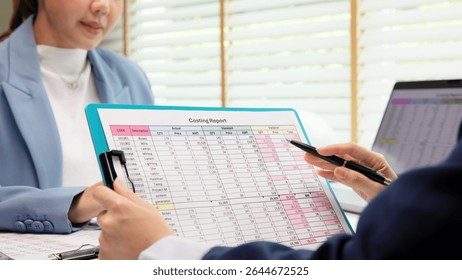 Expert woman asian people discuss review data number costing managerial account prepare monthly actual cost variance report income tax at audit office. ESG budget control ERP process service project.