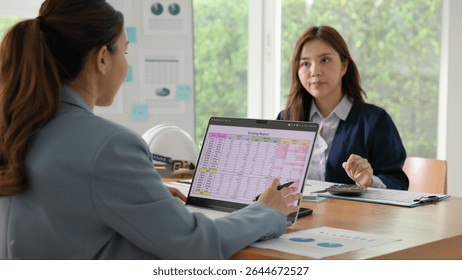 Expert woman asian people discuss review data number costing managerial account prepare monthly actual cost variance report income tax at audit office. ESG budget control ERP process service project.