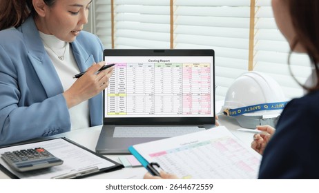 Expert woman asian people discuss review data number costing managerial account prepare monthly actual cost variance report income tax at audit office. ESG budget control ERP process service project.