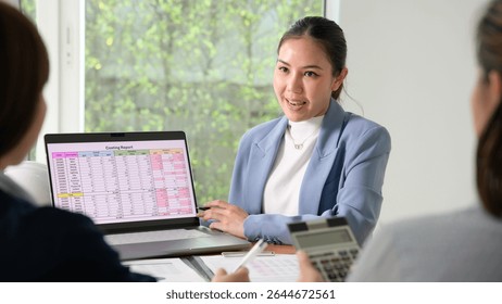 Expert woman asian people discuss review data number costing managerial account prepare monthly actual cost variance report income tax at audit office. ESG budget control ERP process service project.