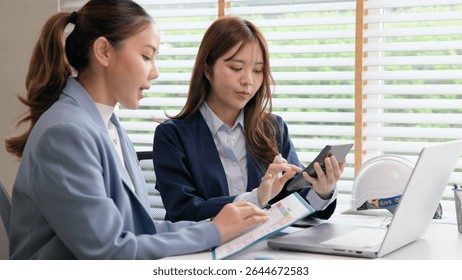 Expert woman asian people discuss review data number costing managerial account prepare monthly actual cost variance report income tax at audit office. ESG budget control ERP process service project.