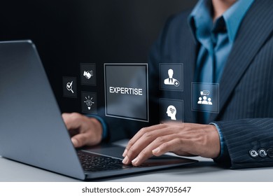 Expertise business consulting concept. expert, consulting, knowledge, team, advice, trust and research. Businessman using laptop with expertise icon on virtual screen.