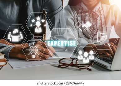 Expertise, expert, consulting, knowledge, team, advice, trust and research concept, Business person team working on laptop computer with Expertise icon on virtual screen, Business and development. - Shutterstock ID 2240966447