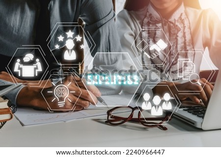 Expertise, expert, consulting, knowledge, team, advice, trust and research concept, Business person team working on laptop computer with Expertise icon on virtual screen, Business and development.