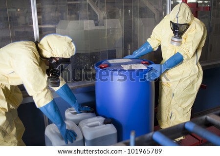 Experts disposing infested material