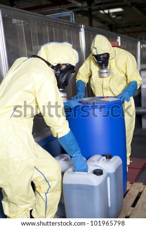 Experts disposing infested material