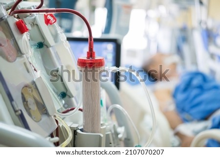 Experts are preparing a dialysis machine for use in critically ill patients in hospital intensive care units. Acute renal failure. End stage renal disease.
