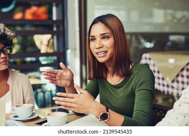 Explaining her point of view over the matter. Cropped shot of designers having a meeting at a coffee shop. - Shutterstock ID 2139545433