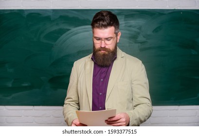 Explaining Theory. College And High School. Prepare For Test. Teacher Bearded Man Hold Documents Chalkboard Background. Teacher Paperwork. School Principal. Demanding Teacher. Lecturer In Classroom.