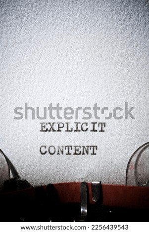 Explicit content text written with a typewriter.