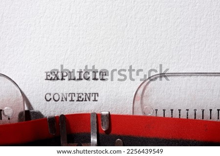 Explicit content text written with a typewriter.