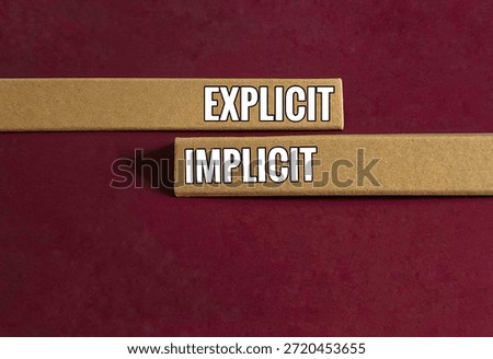 Explicit and implicit words on long cardboard sticks