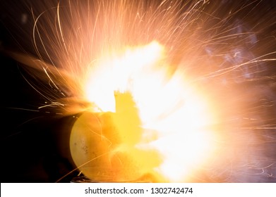 Exploding Apple With Flame, Sparks And Smoke