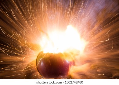 Exploding Apple With Flame, Sparks And Smoke